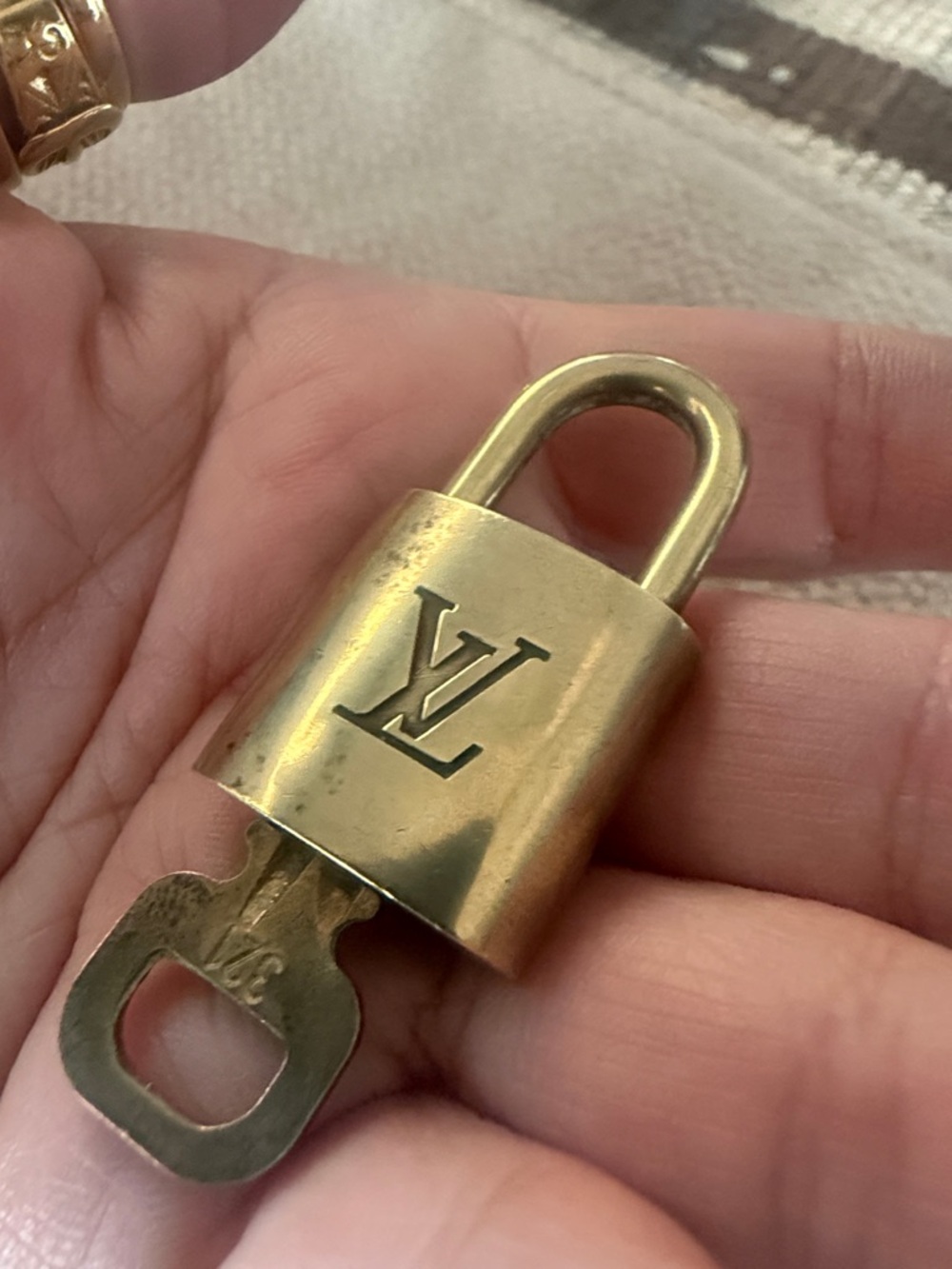 #321 Louis  Vuitton Brass Padlock with Key - Gold Tone